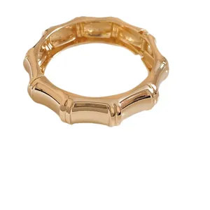 Elegant gold-plated bamboo joint bangle bracelet with a minimalist fashion design for women