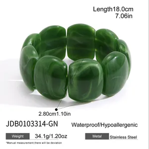 Detail view of a green marbled acrylic bracelet with measurements and material specs.