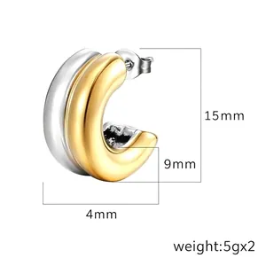 Boucles d'oreilles créoles C bicolores en or 18K et acier avec détails de taille