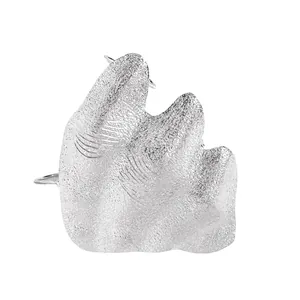 Macro view of artistic irregular pleated silver ring with textured frosted surface