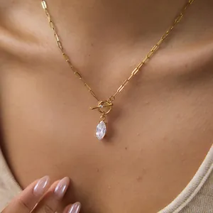 Elegant gold titanium steel paperclip necklace with marquise zircon pendant on model
