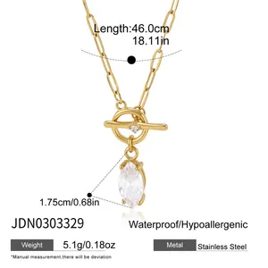Detail view of 18k gold plated stainless steel necklace with marquise zircon pendant