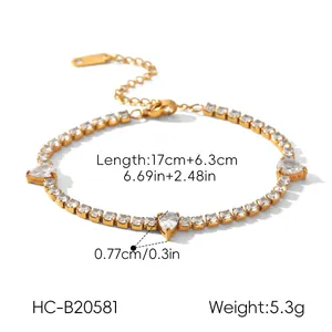 Bracelet en acier titane doré avec zircons en forme de poire et infos de taille