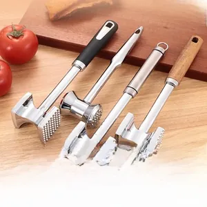 Variety of stainless steel meat tenderizers with wood and non-slip handles on a board
