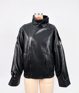 Detailed view of a vintage black textured faux leather pilot jacket on a mannequin.
