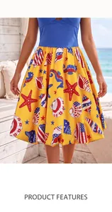 Vibrant yellow bubble hem dress featuring detailed starfish and seashell ocean prints