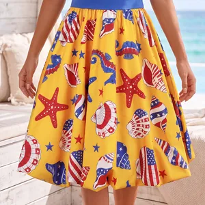 Yellow high-waist skirt with blue waistband featuring starfish and seashell marine prints