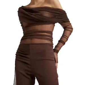 Slim fit off-shoulder brown mesh top with ruched layers and matching side-stripe pants