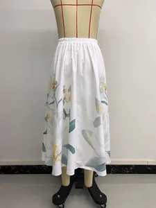 Detail of floral printed midi skirt showing elastic high waist and breathable fabric