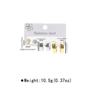 Three-pair set of stainless steel earrings featuring crystal studs and polished hoops