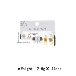 Detailed set of stainless steel earrings featuring crystal studs and textured hoops
