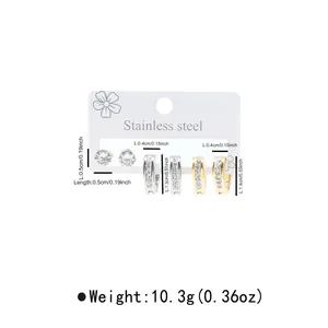 Detailed size chart for stainless steel stud earrings and hoop earrings set on white card