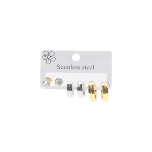 Three-pair stainless steel earring set with zircon studs and gold-silver small hoops