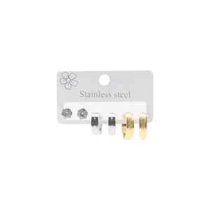 Detail of three-pair stainless steel earring set with polished and matte finishes