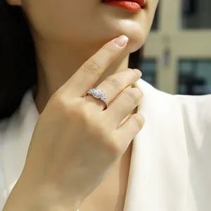 Elegant 925 sterling silver ring with 1 carat round moissanite on a woman's hand