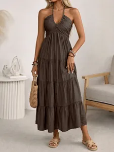 Mocha tiered halter maxi dress with boho design and breathable fabric texture details