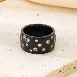 Elegant black wide titanium steel band ring with scattered starry rhinestones for women