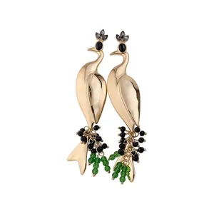 Elegant peacock-shaped gold-tone drop earrings with green and black crystals on white