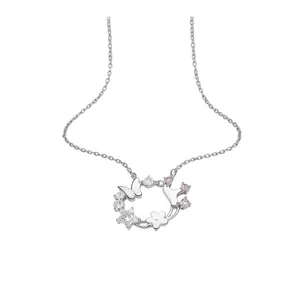 Elegant silver-toned necklace featuring butterfly and zircon flower pendant on white background.