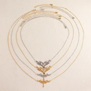 Detailed view of gold and silver thorn heart body chains in concentric layout