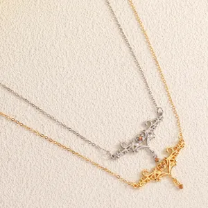 Detailed macro shot of vintage gold and silver heart-shaped thorn body chains