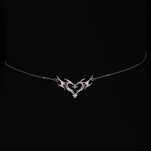 Detailed view of a thorny heart waist chain with a central star, metallic silver finish.
