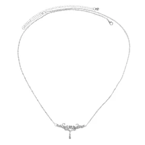 Detailed view of vintage silver engraved thorn heart body chain for women
