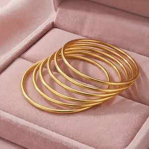 Set of 7 stackable 18k gold plated stainless steel 3mm round wire bangles