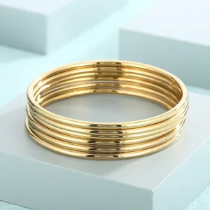 Detailed view of the 3mm 18k gold plated stainless steel stackable plain ring bangles set