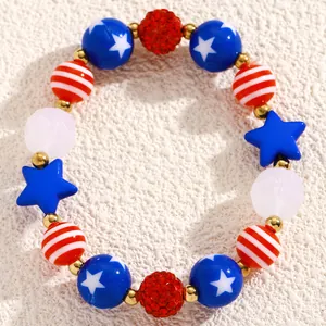 Top view of Independence Day beaded bracelet with red white and blue stars and stripes