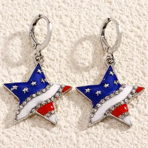 Detailed shot of star earrings with American flag enamel and rhinestone accents