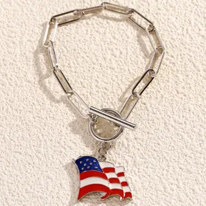 Silver rectangle link bracelet with OT clasp and enamel American flag wing heart charm