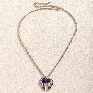 Detail of silver chain with red white and blue enamel wings heart pendant set