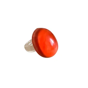 Vibrant orange oval resin ring with transparent band, minimalist dopamine style ring