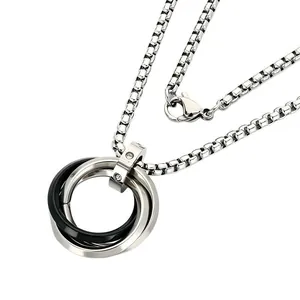 Unisex stainless steel interlocking ring pendant necklace in silver and black finish