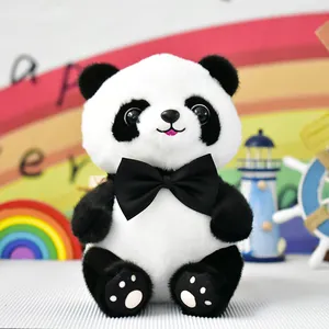 Een close-up van een schattige panda knuffel met een stijlvolle zwarte vlinderdas en zachte vacht