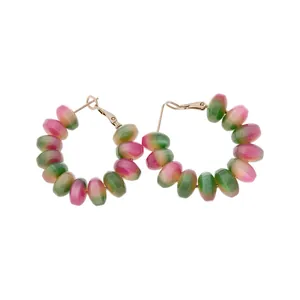 Colorful resin bead hoop earrings with a gradient pink and green summer style design