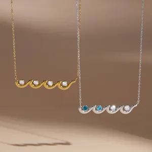 Close-up detail of wavy titanium steel necklaces featuring sparkling inlaid zircons