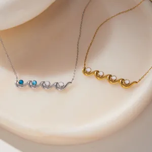 Detailed macro shot of elegant wave-shaped titanium steel necklaces with inlaid zircons