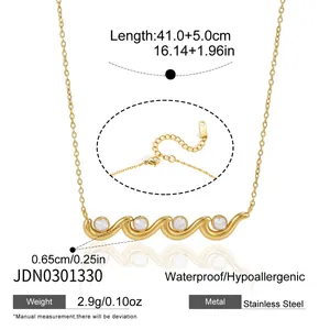 Detail view of gold wave necklace with zircons showing dimensions and stainless steel material