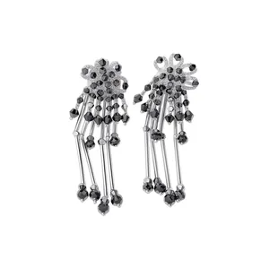 Vintage floral crystal tassel earrings with black faceted beads and silver finish details.