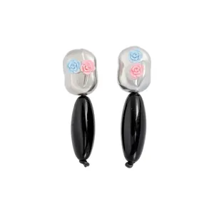 Vintage style silver stud earrings with delicate resin flowers and black drops