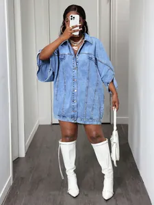 Oversized light blue denim shirt dress with batwing sleeves and button front closure