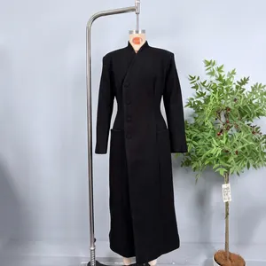 Slim fit black wool coat for women with stand collar and side buttons details