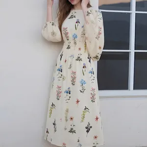 Robe longue élégante à imprimé fleuri avec manches bouffantes et taille élastiquée