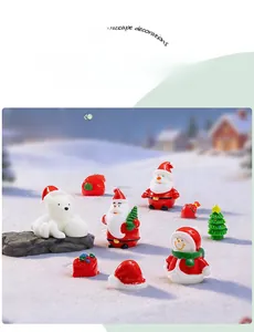 Macro detail of resin Christmas miniatures set featuring Santa, Snowman and Polar Bear