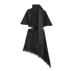 Elegant black satin dress with lace hem, high neck scarf, and waist cutout detail