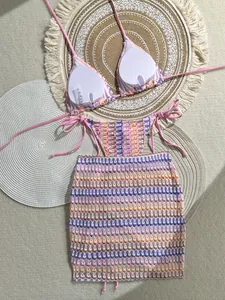 Detail of crochet knit halter bikini with skirt showing woven texture and size S tag