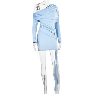 Close-up of light blue one-shoulder ruched dress with slim fit and long streamer detail