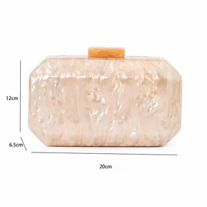 Detail view of champagne marble acrylic evening clutch showing 20x12x6.5 cm dimensions